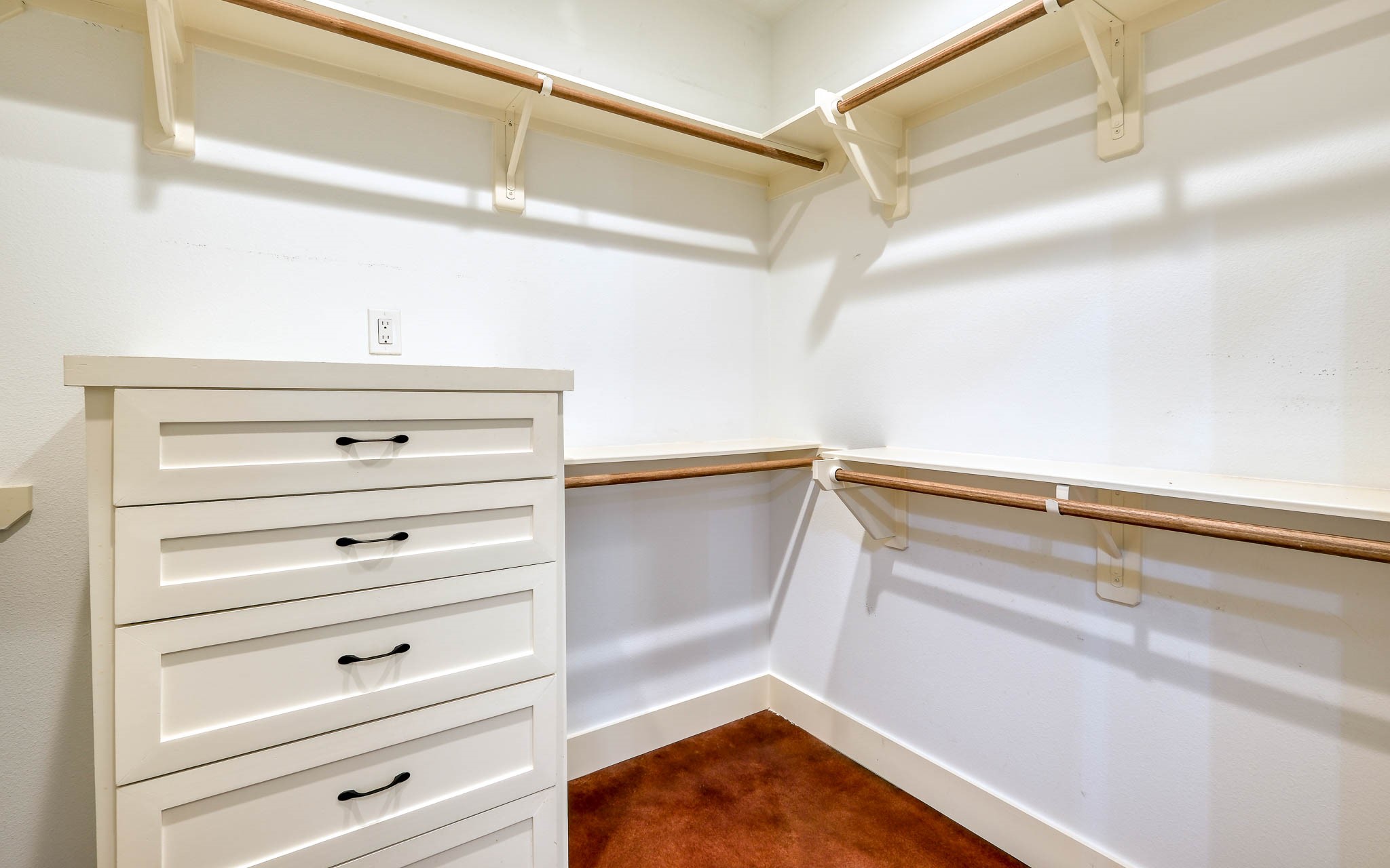 40934 Thomas Lane Hempstead, TX 77445 - Photo 22 of 50 a view of walk in closet with empty racks