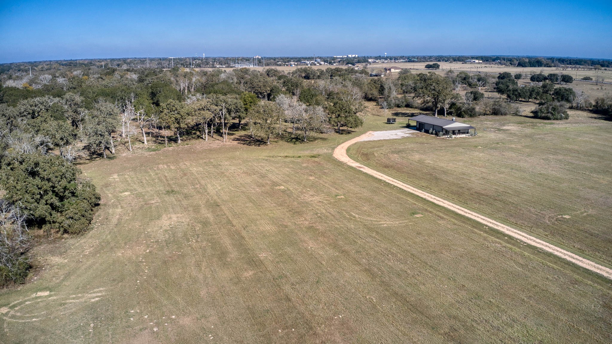 40934 Thomas Lane Hempstead, TX 77445 - Photo 41 of 50 an aerial view of a forest with a yard