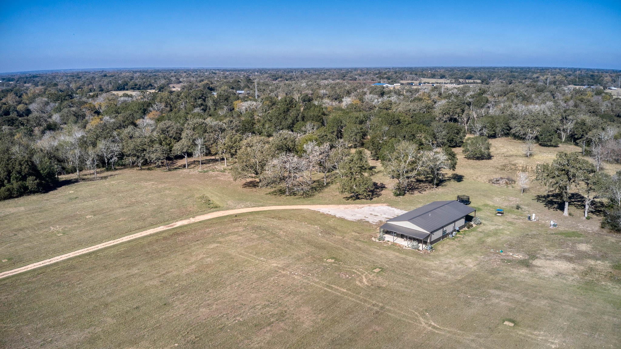 40934 Thomas Lane Hempstead, TX 77445 - Photo 45 of 50 an aerial view of a house with a yard