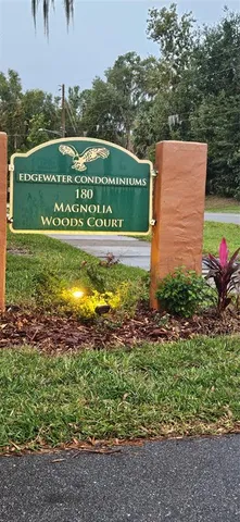 a view of a big yard with potted plants
