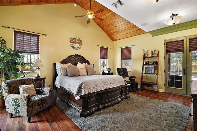a kitchen with a refrigerator and a stove
