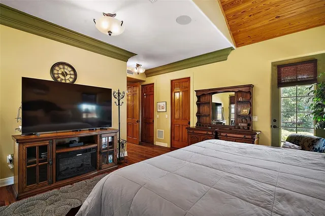 a view of a swimming pool with a patio