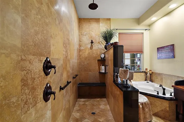 a view of a patio with a table chairs and a backyard