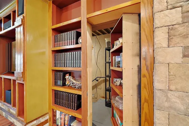 a room with gym equipment and a window