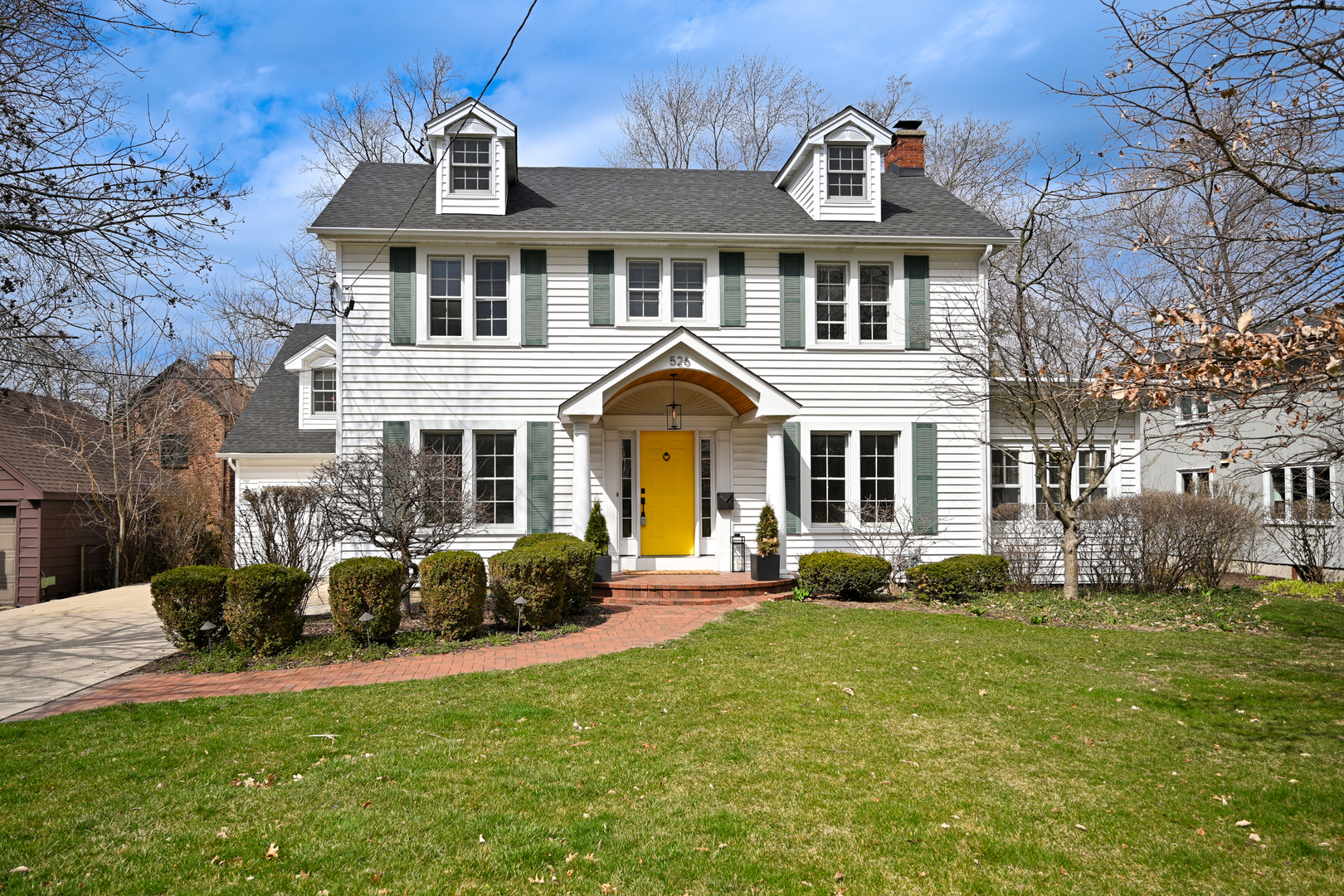 526 Maple Street Glen Ellyn, IL 60137 - Photo 1 of 1 a front view of a house with garden and porch