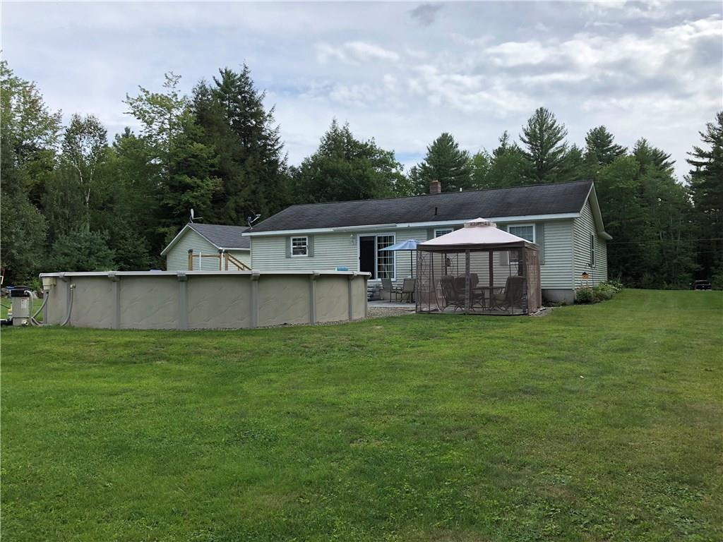 59 Macomber Hill Road Jay, ME 04239 - Photo 2 of 35 Large back yard with views of pool.
