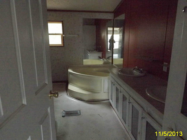 1270 Lick Ridge Road Northeast Check, VA 24072 - Photo 5 of 11 a bathroom with a sink and a mirror