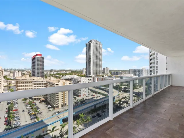 a view of a city skyline from a balcony