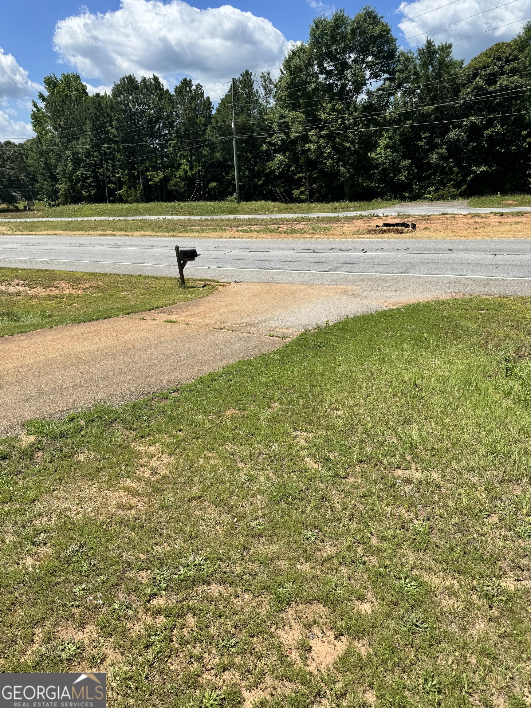 2883 Highway 441 Commerce, GA 30529 - Photo 4 of 12 a view of an outdoor space and swimming pool