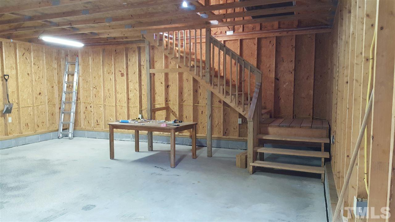 1060 Wrenn Crumpton Road Roxboro, NC 27574 - Photo 21 of 21 a view of entryway with stairs and furniture