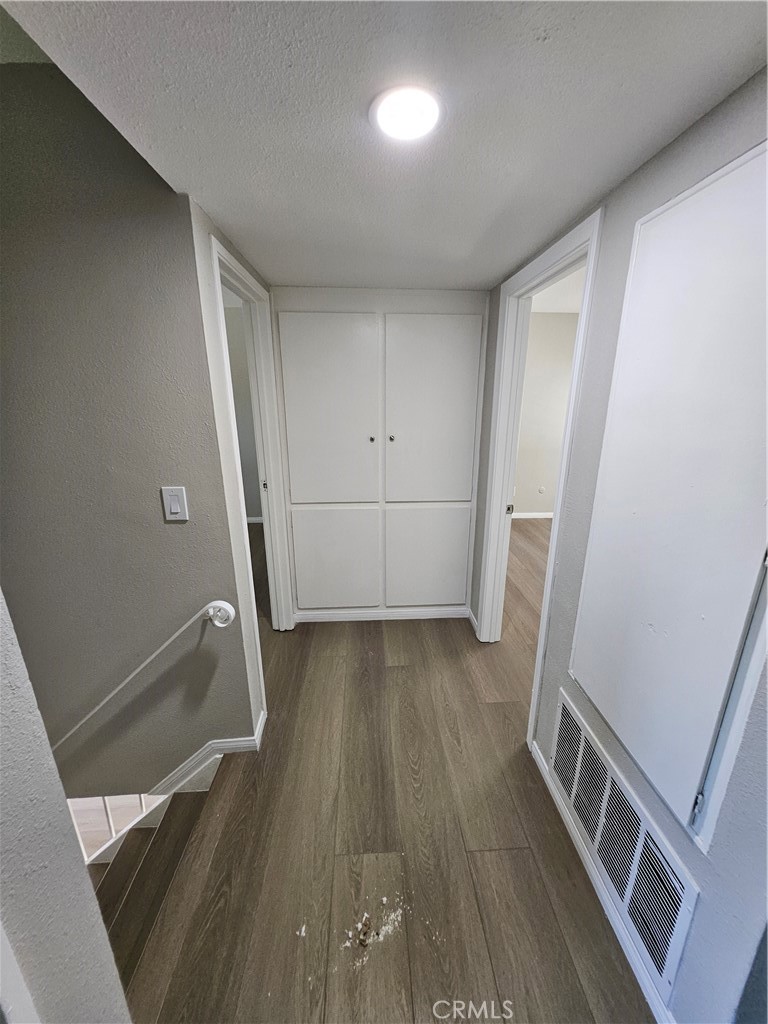 1151 Clark Street Riverside, CA 92501 - Photo 11 of 24 wooden floor in an empty room with a window