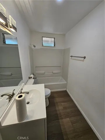 a bathroom with a sink and a tub