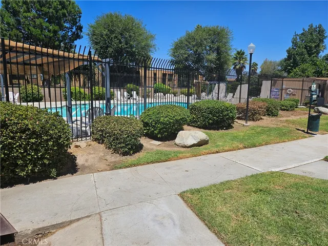 a view of a garden with potted plants