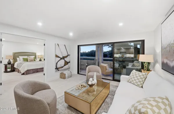 a bedroom with a bed and a night lamp
