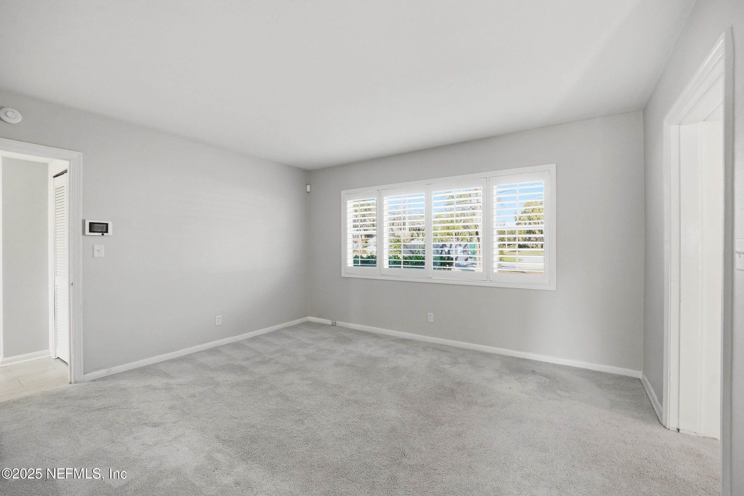 6500 Altama Road Jacksonville, FL 32216 - Photo 12 of 30 an empty room with windows