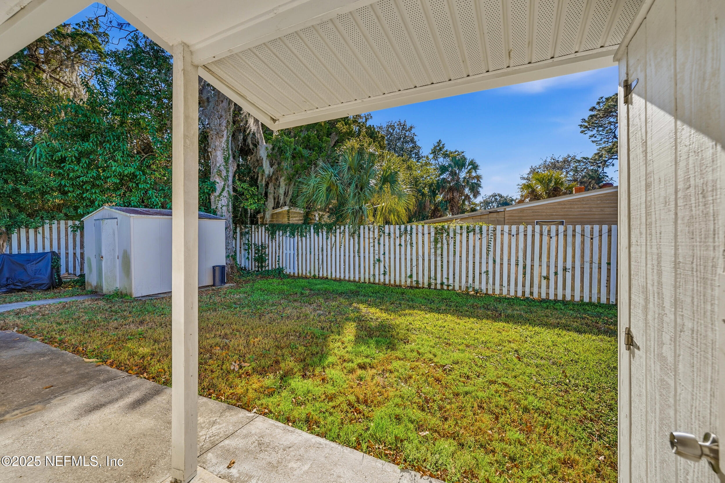 6500 Altama Road Jacksonville, FL 32216 - Photo 20 of 30 a view of a porch with a backyard