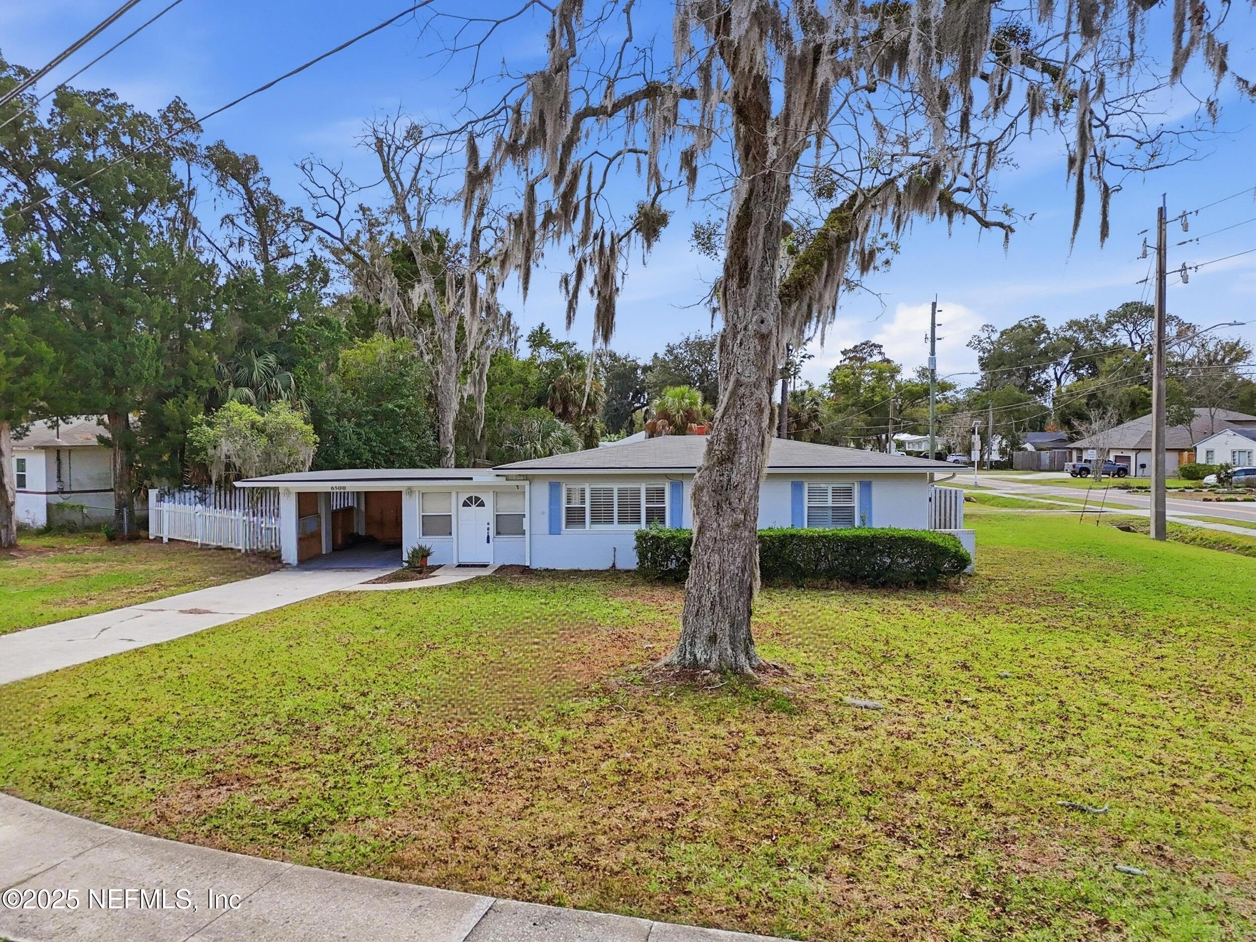 6500 Altama Road Jacksonville, FL 32216 - Photo 2 of 30 a view of a house with a yard