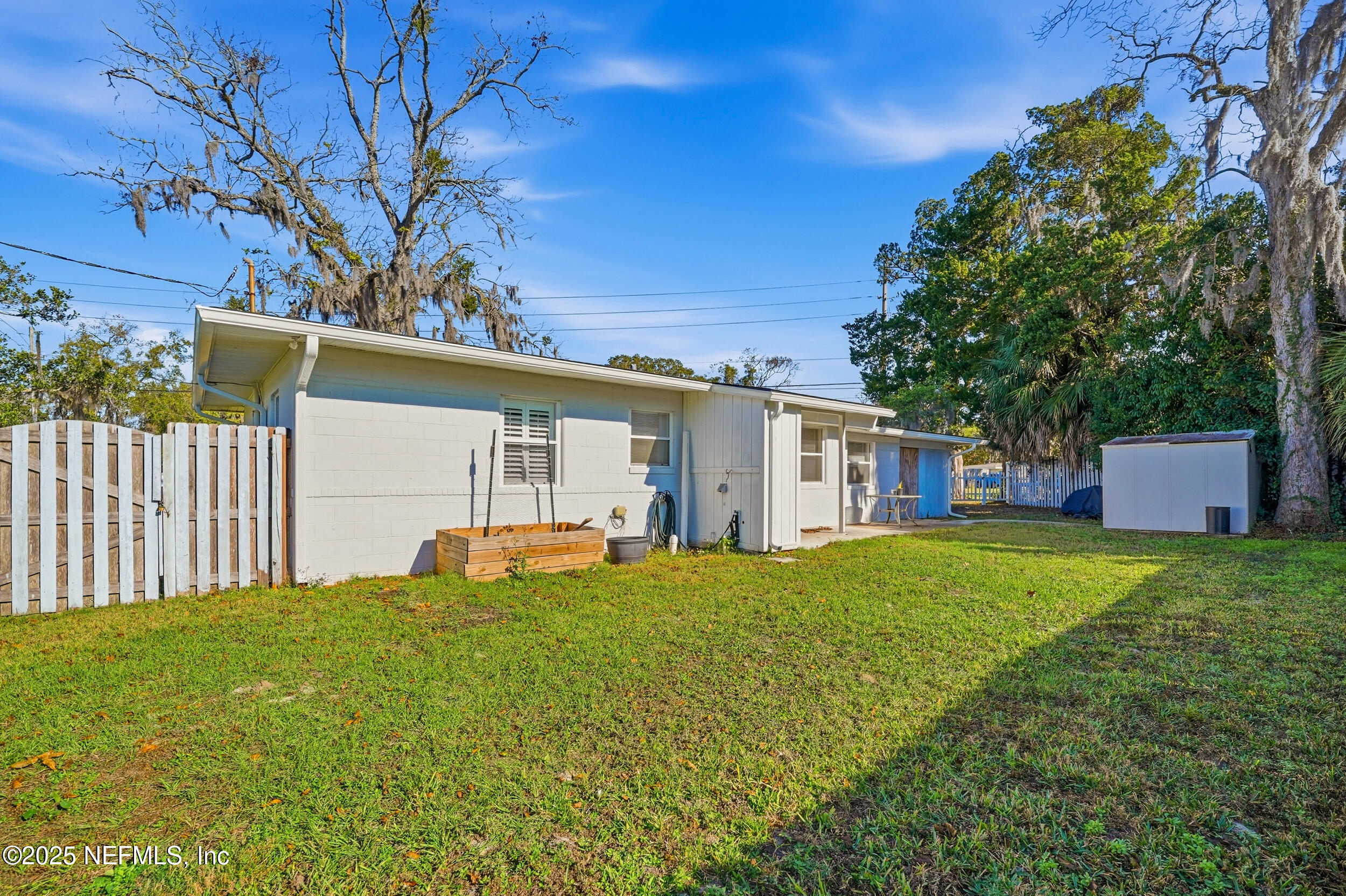 6500 Altama Road Jacksonville, FL 32216 - Photo 25 of 30 a house view with a sitting space and garden