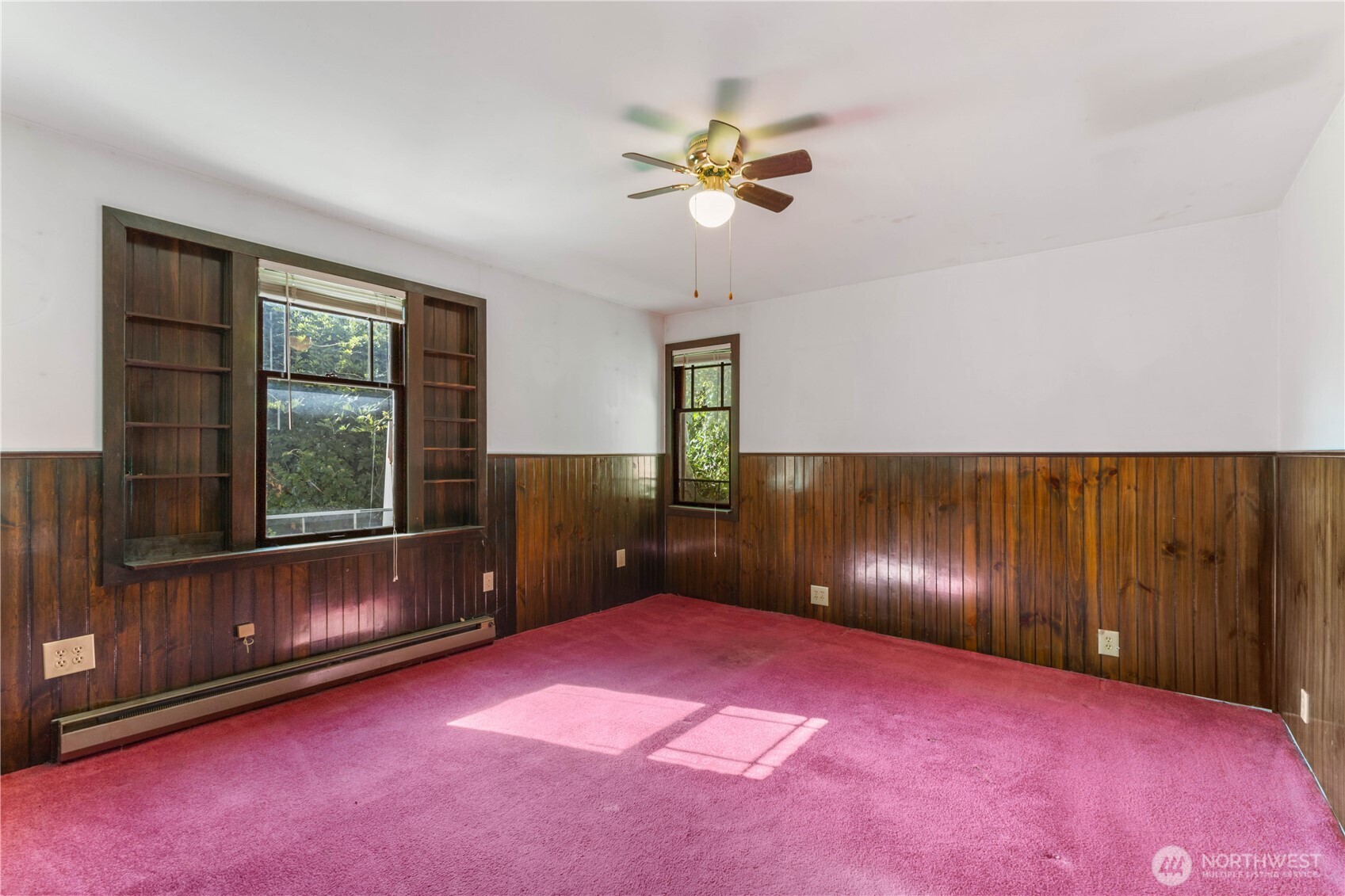 111 4th Avenue Southwest Pacific, WA 98047 - Photo 13 of 19 a view of an empty room with a window and wooden floor