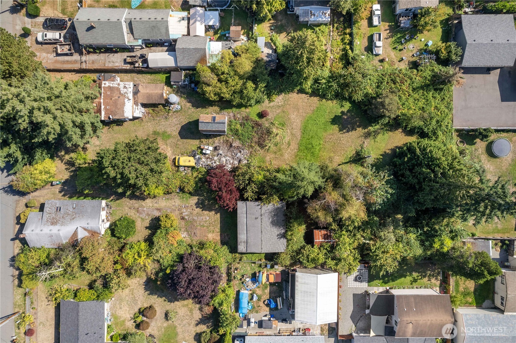 111 4th Avenue Southwest Pacific, WA 98047 - Photo 19 of 19 an aerial view of a house with a yard and garden