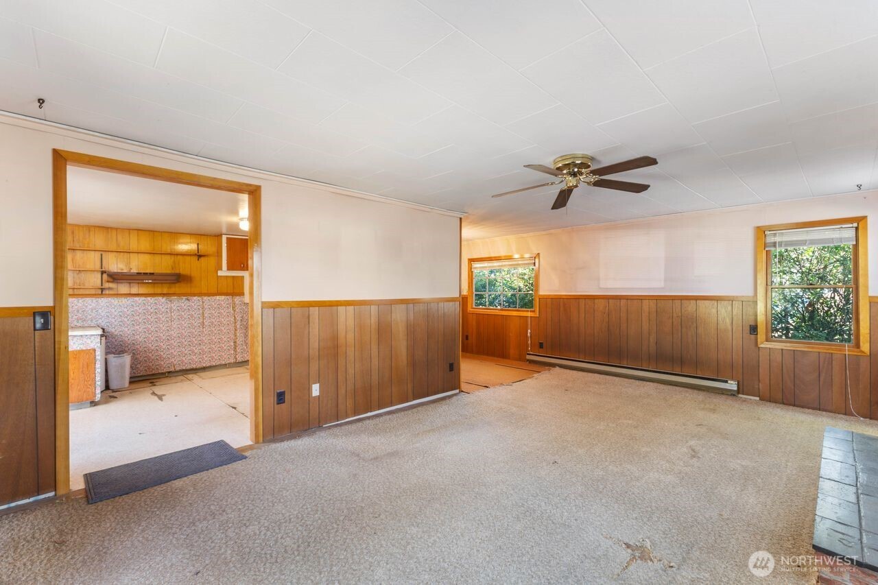 111 4th Avenue Southwest Pacific, WA 98047 - Photo 6 of 19 a view of an empty room and a window