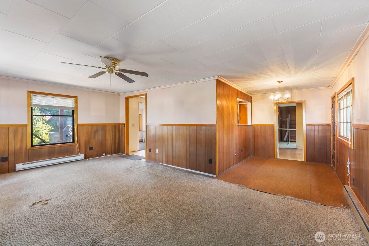 111 4th Avenue Southwest Pacific, WA 98047 - Photo 7 of 19 a view of an empty room with a window