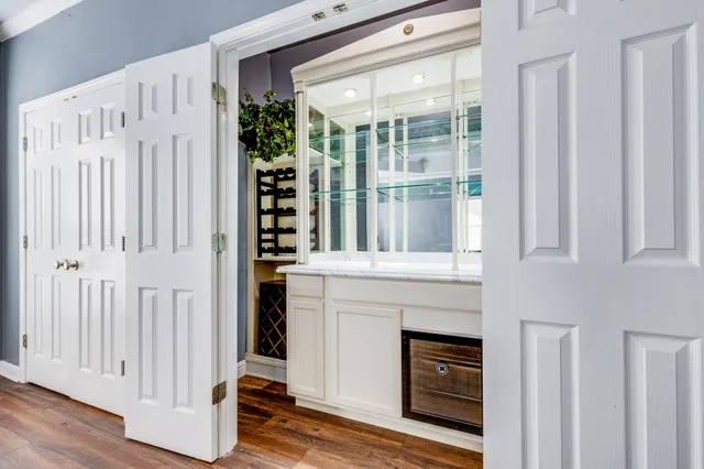 a picture of a cabinet with a white wall and a white wall