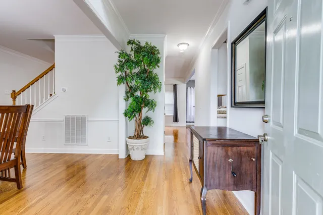 a livingroom with furniture and wooden floor