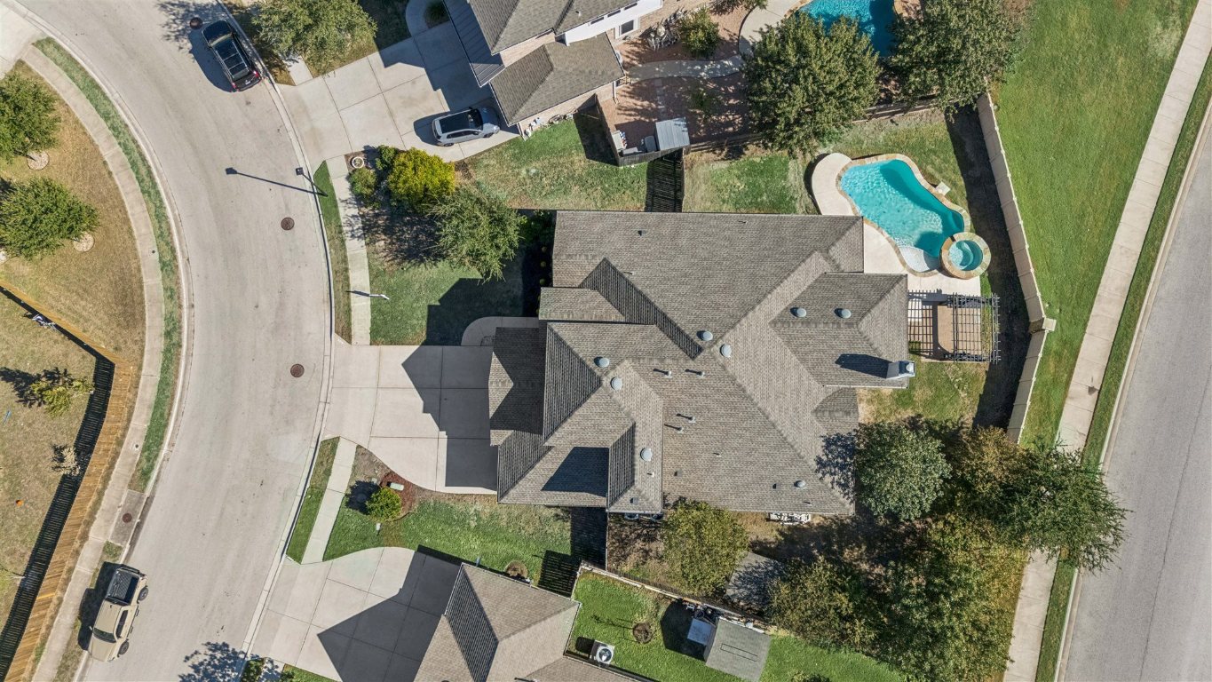 3329 Eagle Ridge Lane Pflugerville, TX 78660 - Photo 31 of 35 Bird's eye view of a pool