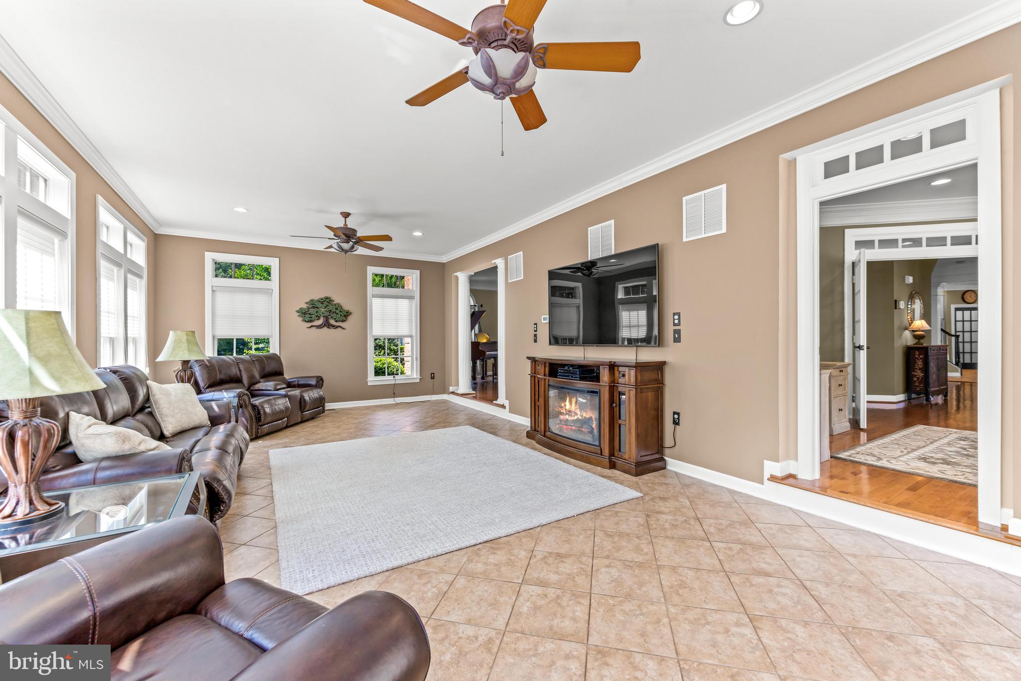 1703 Lake Forest Drive Finksburg, MD 21048 - Photo 28 of 82 a living room with furniture and a flat screen tv