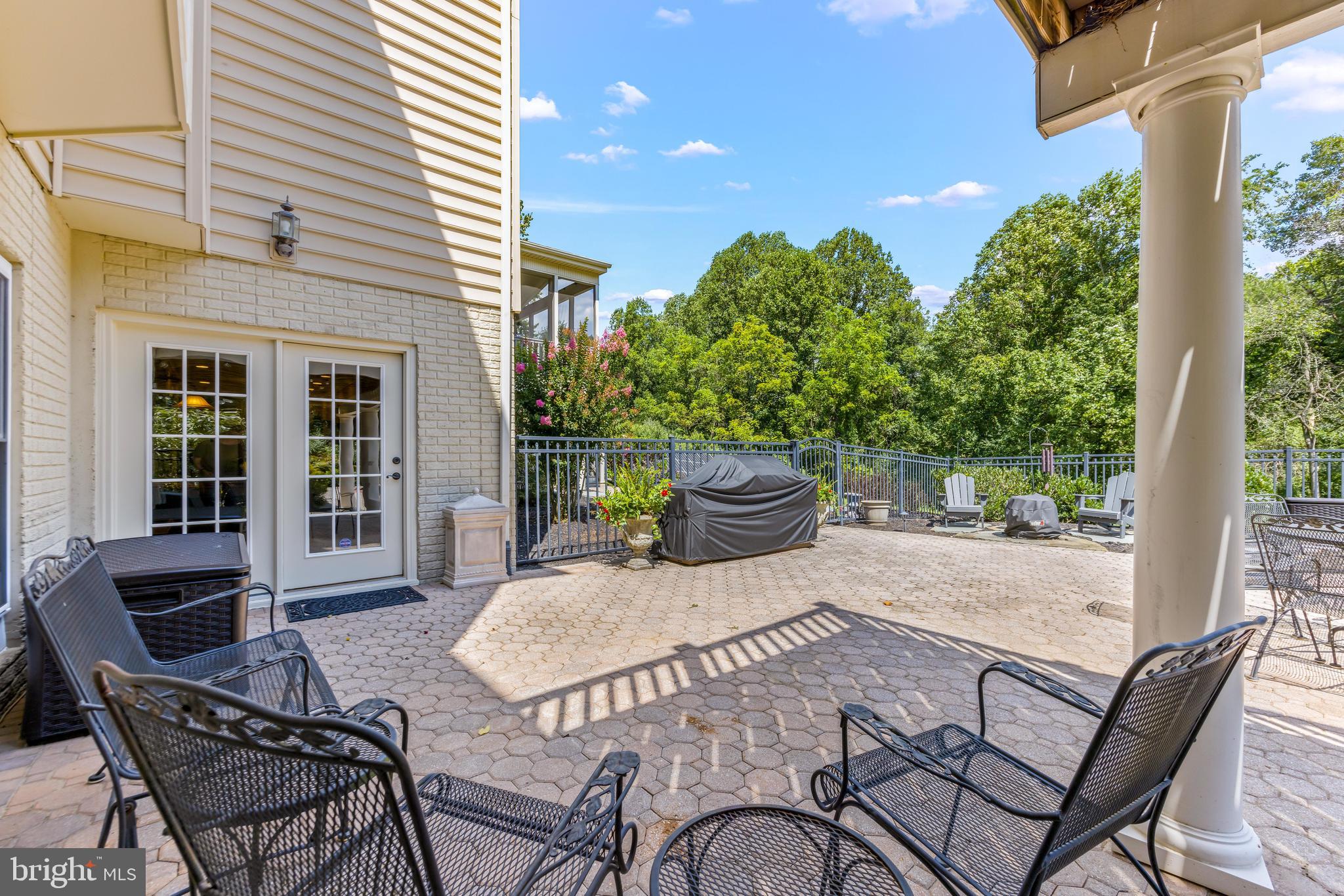 1703 Lake Forest Drive Finksburg, MD 21048 - Photo 78 of 82 a view of a patio with table and chairs and potted plants