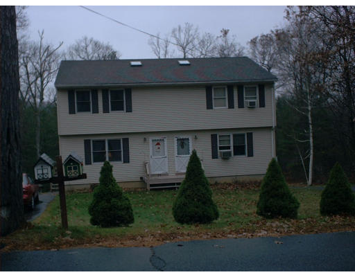 22 Lake George Road Wales, MA 01081 - Photo 1 of 1 a front view of a house with a garden