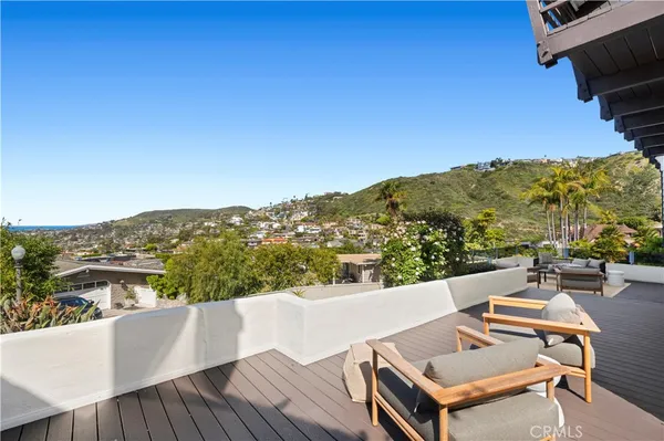 a view of a terrace with furniture
