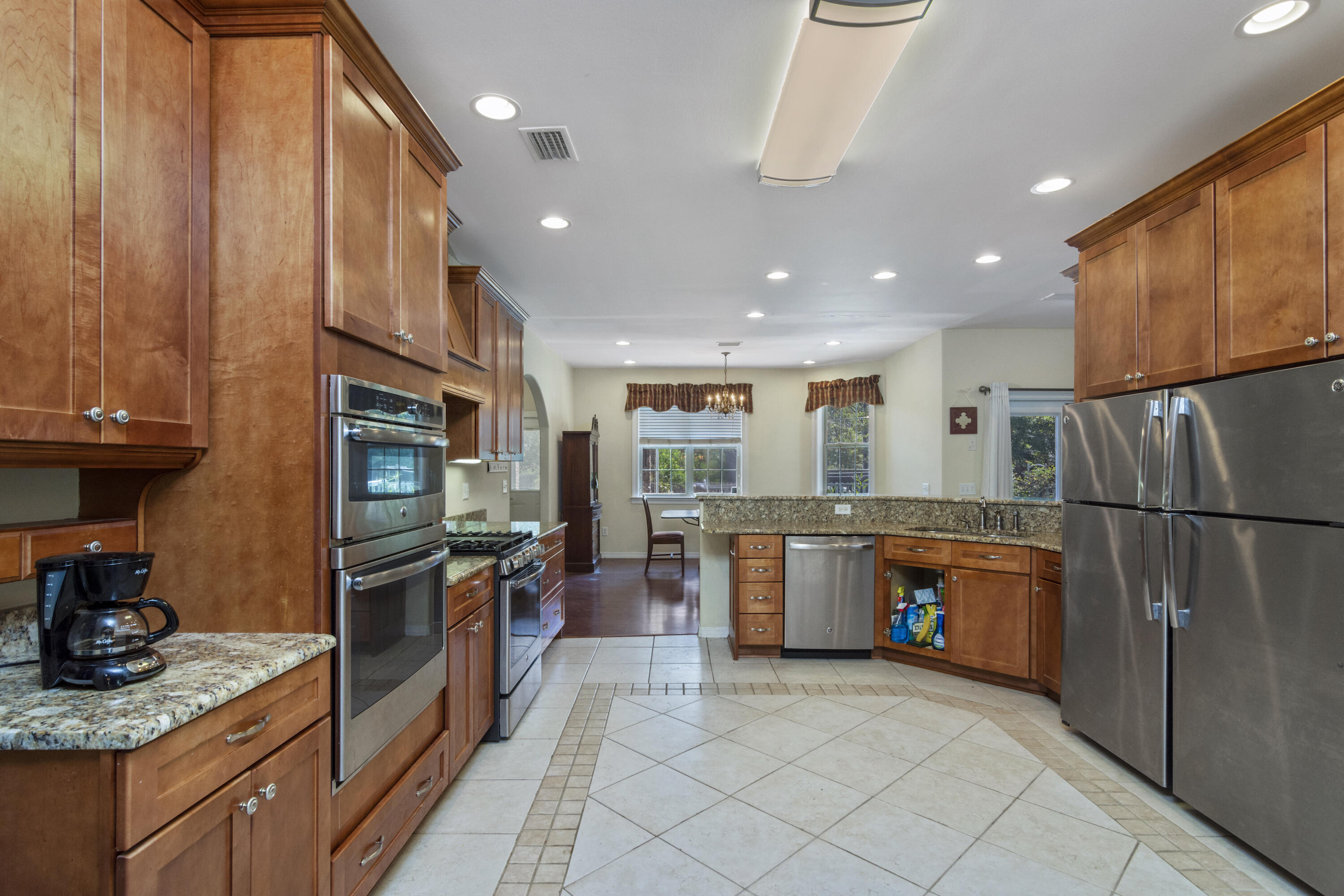 960 Long Road DeFuniak Springs, FL 32433 - Photo 4 of 38 a kitchen with refrigerator and microwave