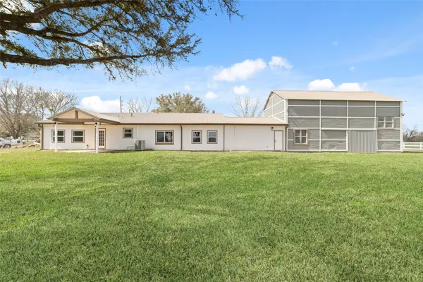 a house view with a garden space