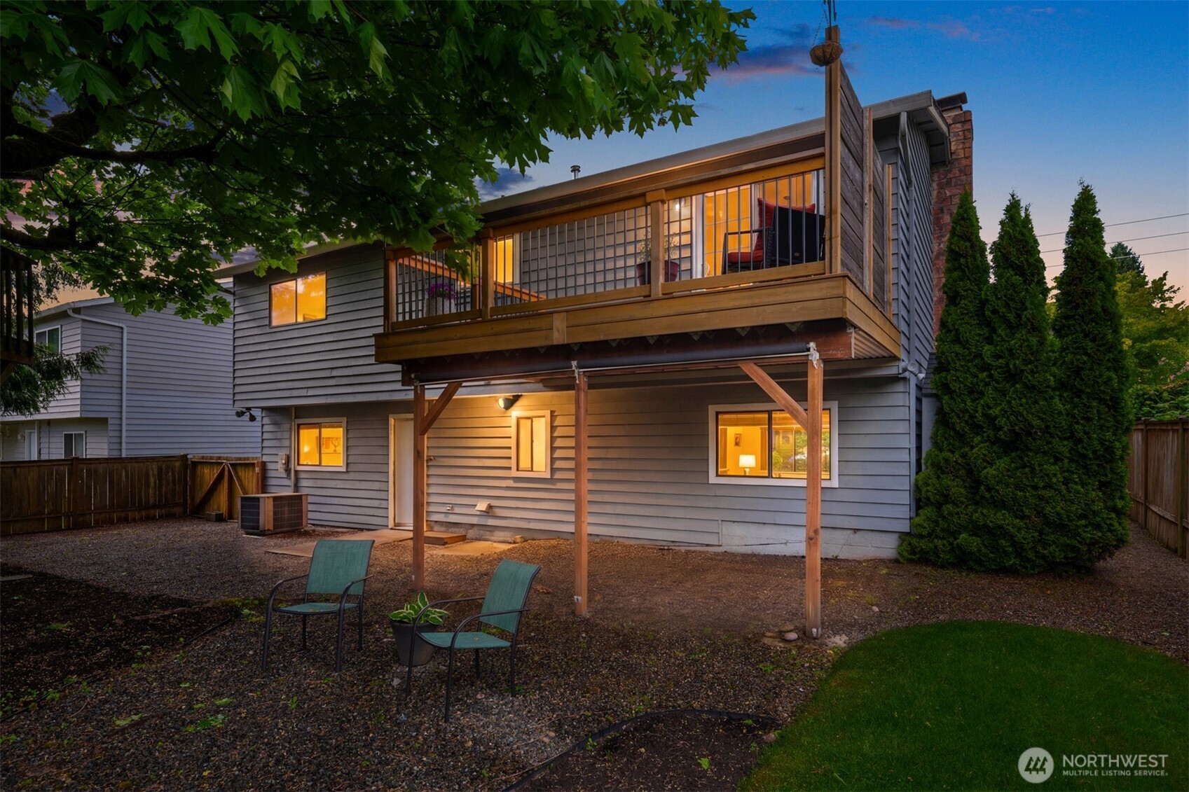 418 212th Street Southwest Bothell, WA 98021 - Photo 40 of 40 a front view of a house with garden