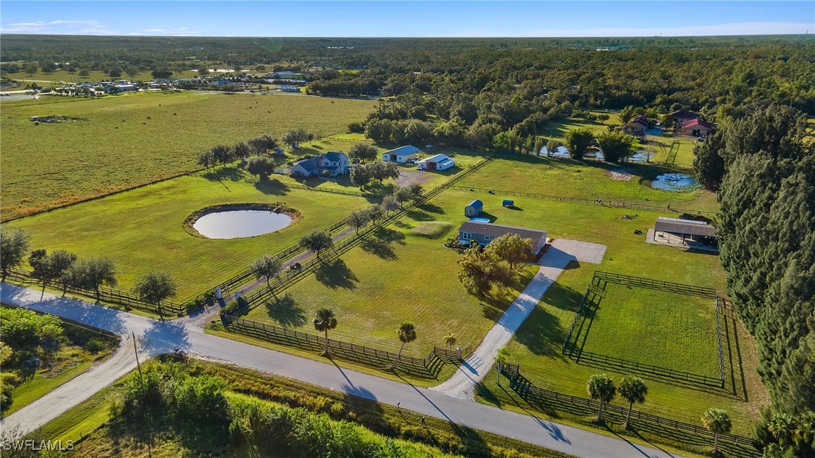 11720 Ruden Road North Fort Myers, FL 33917 - Photo 42 of 48 an aerial view of residential houses with outdoor space