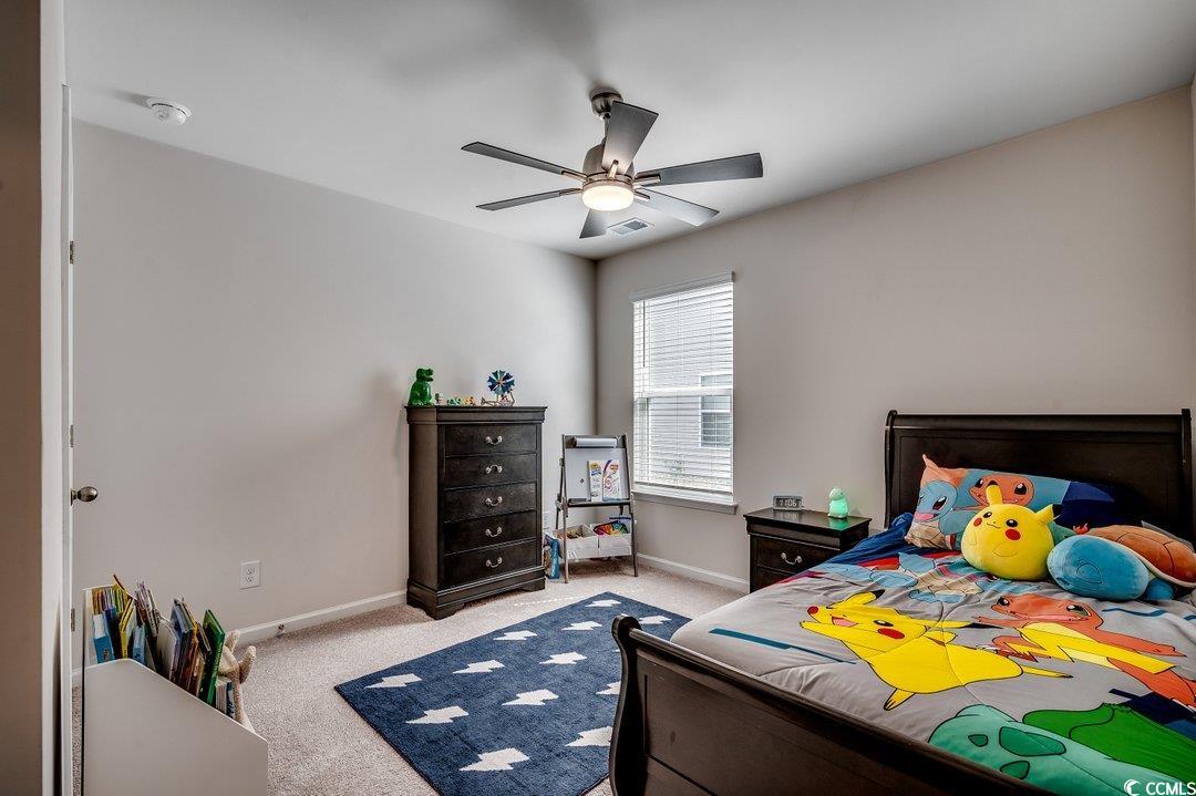 777 Woodland Farms Circle Aynor, SC 29511 - Photo 23 of 31 Bedroom featuring baseboards, a ceiling fan, visible vents, and light carpet