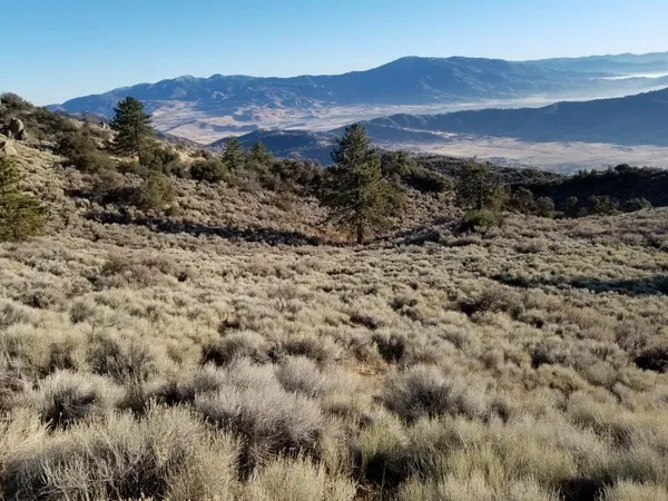 a view of mountain and a mountain