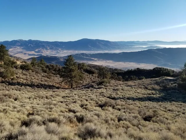 a view of mountain and a mountain