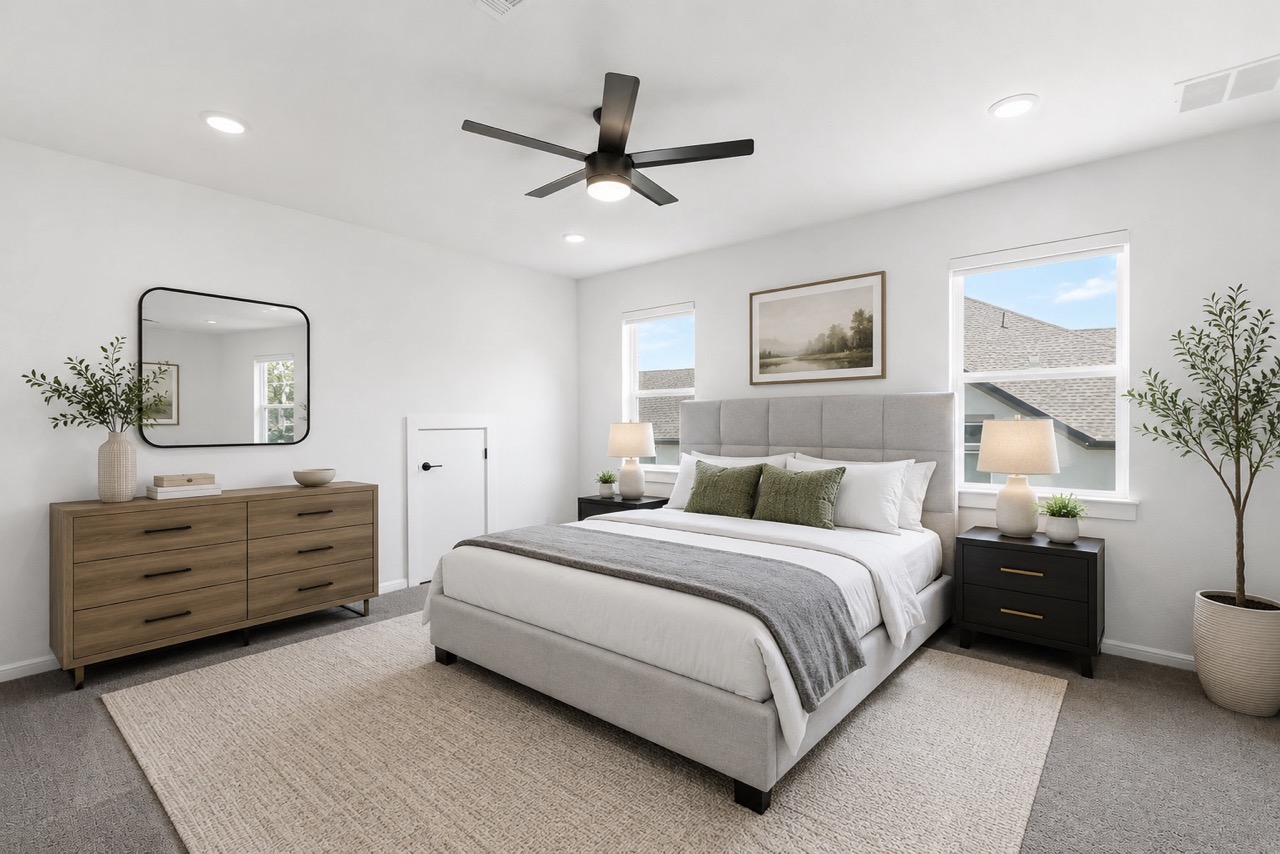 836 Villa Rialto View Leander, TX 78641 - Photo 30 of 33 Discover a tranquil primary bedroom, perfectly illuminated by natural light and offering serene views.