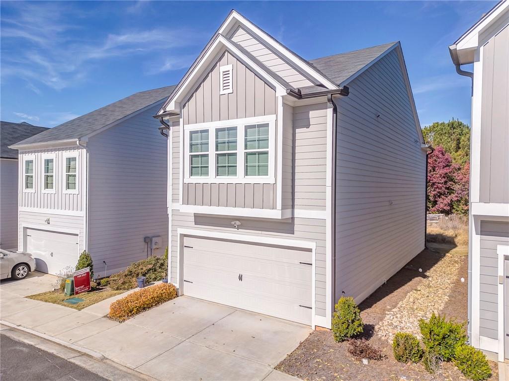 122 Old Mill Drive Calhoun, GA 30701 - Photo 3 of 25 a front view of a house with a yard