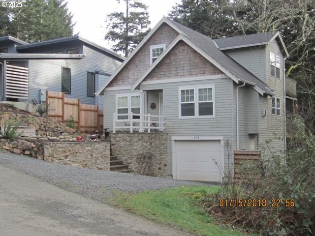 Birch Street Cannon Beach, OR 97110 - Photo 15 of 17 a front view of a house with garden