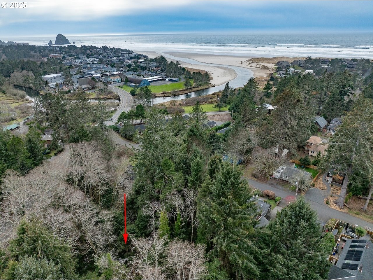 Birch Street Cannon Beach, OR 97110 - Photo 17 of 17 a view of a lake with a city