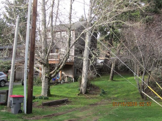 Birch Street Cannon Beach, OR 97110 - Photo 8 of 17 a big yard with lots of green space and plants