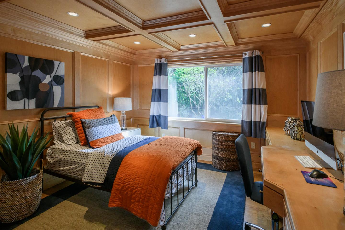 2950 Summit Drive Hillsborough, CA 94010 - Photo 12 of 27 a bedroom with a bed and wooden floor