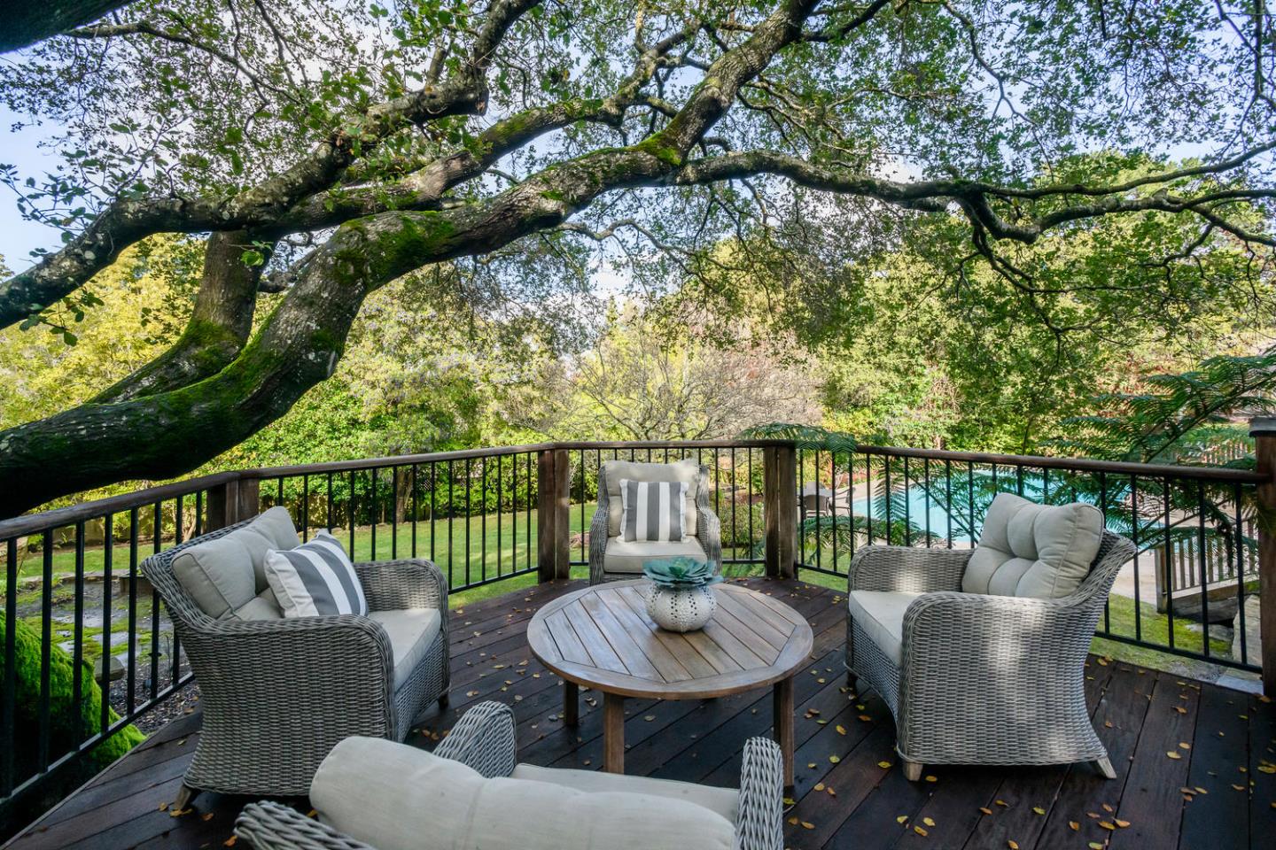 2950 Summit Drive Hillsborough, CA 94010 - Photo 20 of 27 a view of a chair and table in the balcony