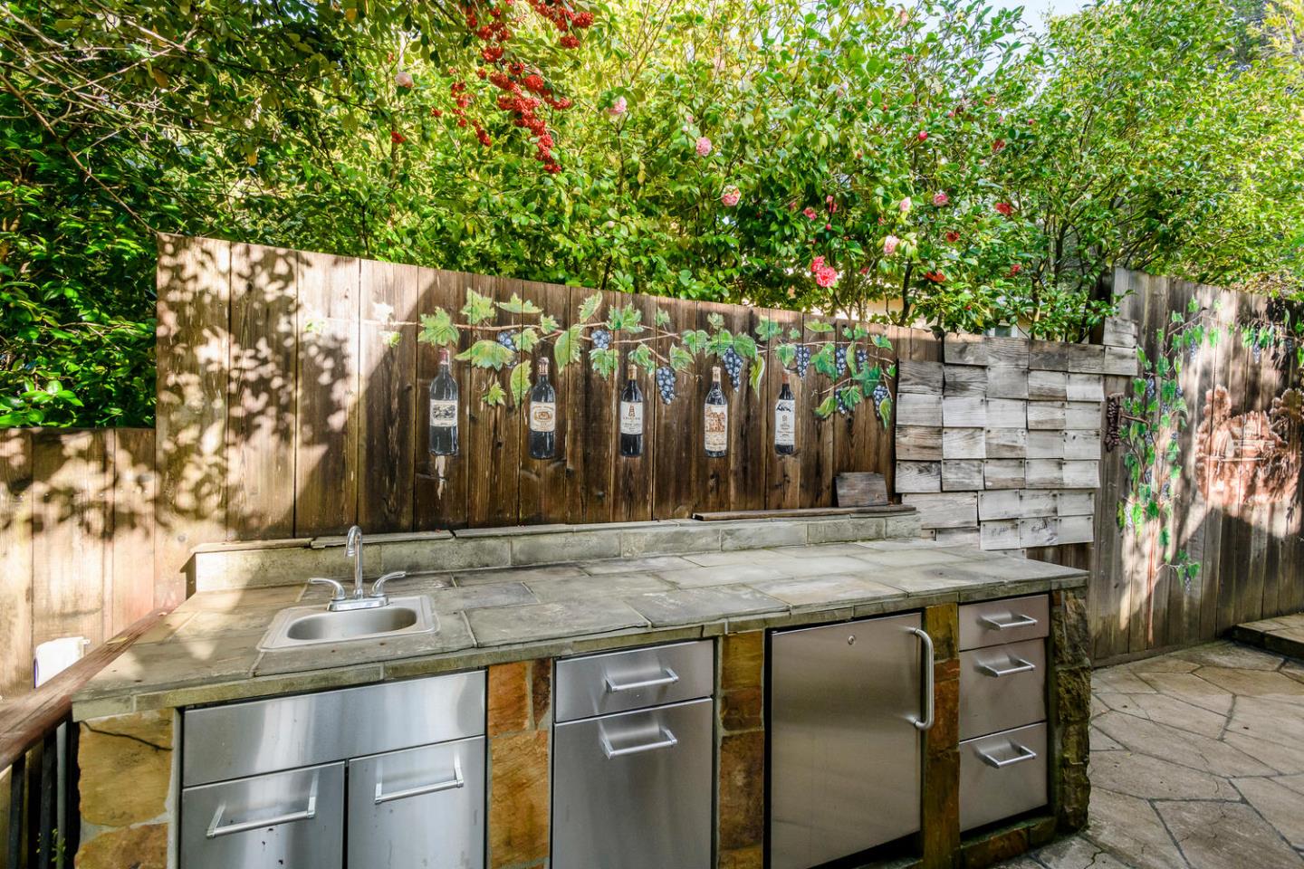 2950 Summit Drive Hillsborough, CA 94010 - Photo 24 of 27 a view of open kitchen with a sink and trees