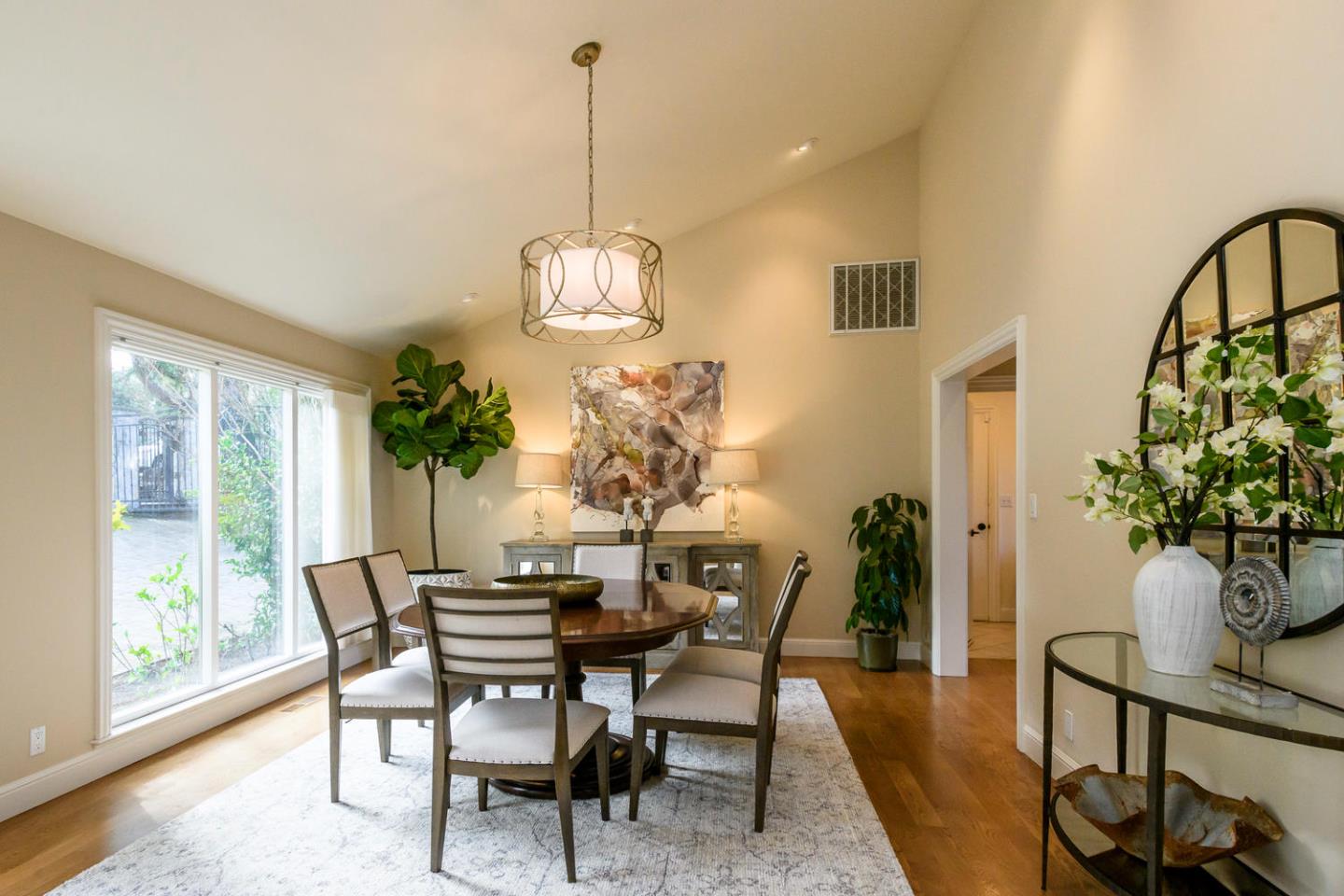 2950 Summit Drive Hillsborough, CA 94010 - Photo 7 of 27 a view of a dining room with furniture window and wooden floor
