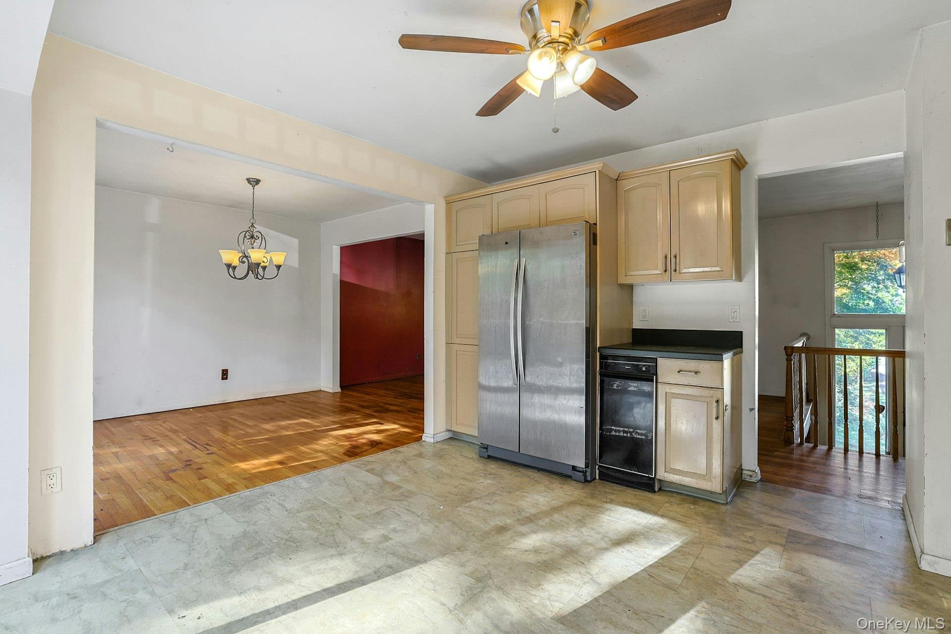 78 Croton Dam Road Ossining, NY 10562 - Photo 13 of 37 a view of a kitchen with a sink and a refrigerator